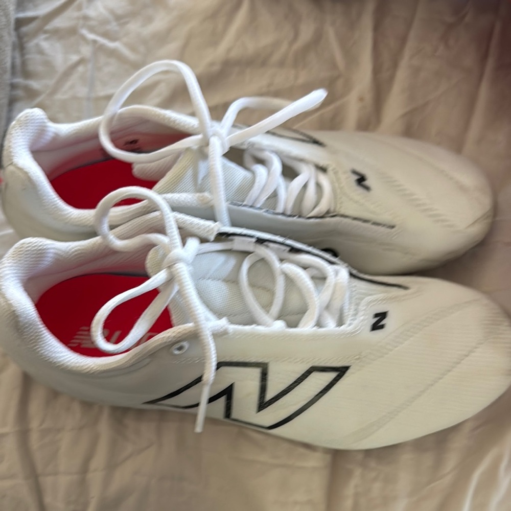 New Balance White and Black lacrosse/football cleats worn once